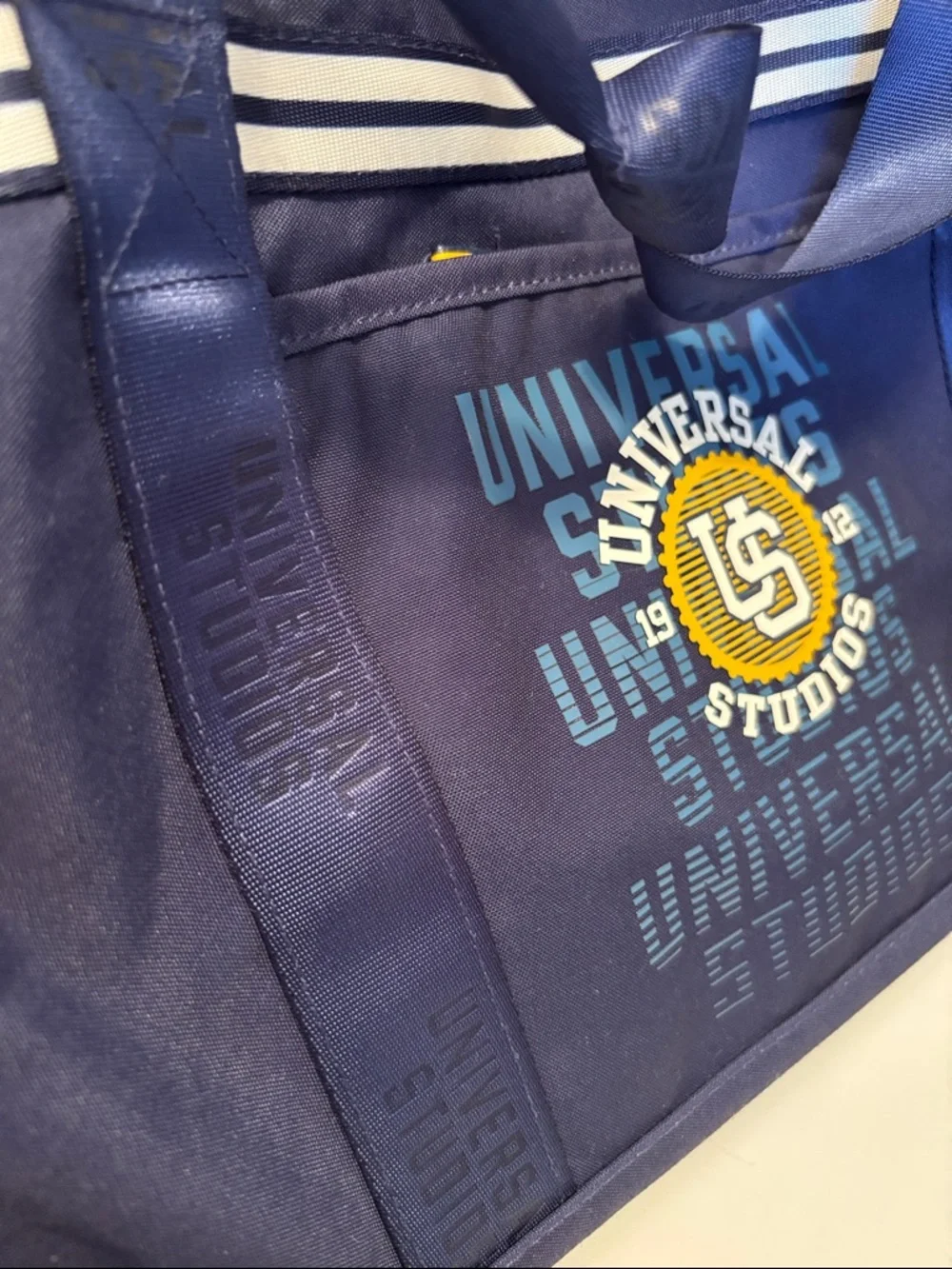 Limited 1912 Universal Studios Navy Duffel Bag with Yellow Logo Accent